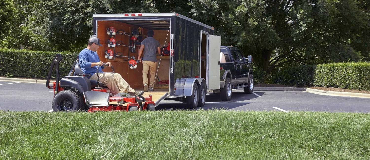 Red Max zero turn mower and utility trailer